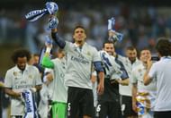 MALAGA, SPAIN - MAY 21:  Raphael Varane of Real Madrid (5) celebrates with team mates after his side are crowned champions following the La Liga match between Malaga and Real Madrid at La Rosaleda Stadium on May 21, 2017 in Malaga, Spain.  (Photo by Aitor Alcalde/Getty Images)
